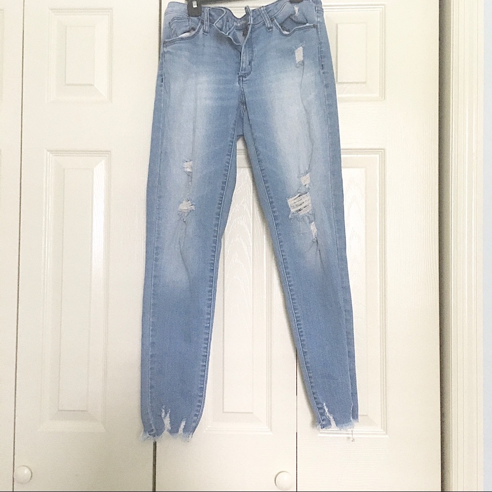 Distressed ripped skinny denim jeans